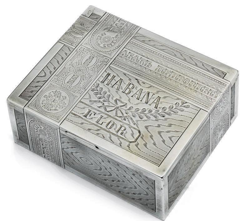 2010_CKS_07899_0049_000(a_russian_silver-gilt_trompe_loeil_cigar_box_mark_of_mikhail_issakov_s).jpg