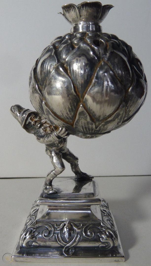 silver-cigar-lighter-elf-holding_1_02a5183ba8a365cb60c97b5e2894dbc1.jpg.6f81890f44a970cb885e7772f6698b75.jpg